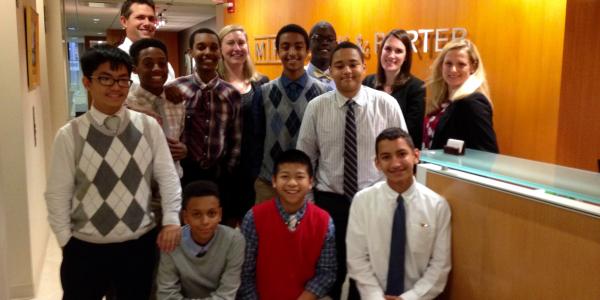 Image of children with members of Melick & Porter